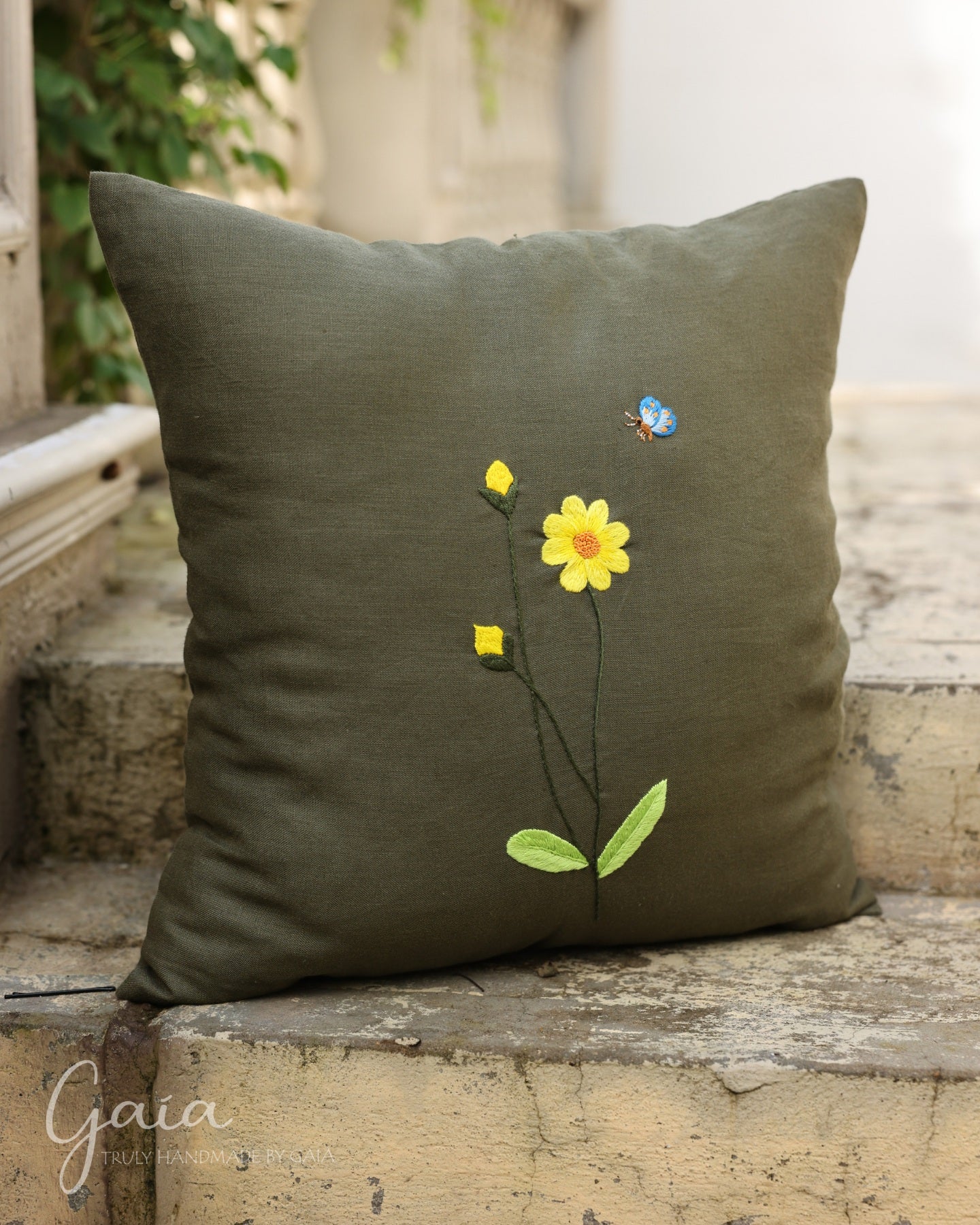 Hand-embroidered linen decorative pillow