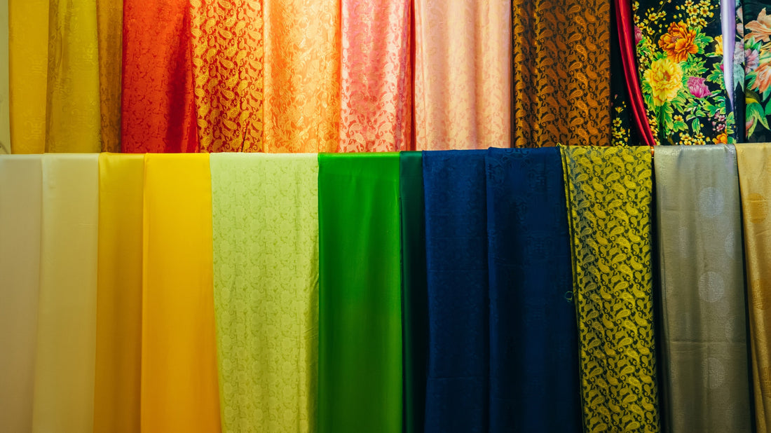 Close-up images of Ao Dai fabrics in different colors