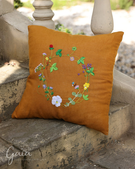 Hand-embroidered linen cushion cover