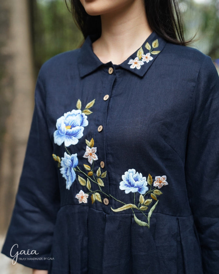 Hand-embroidered linen shirtwaist dress