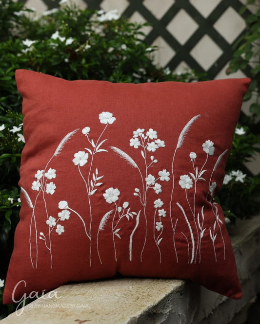 Hand-embroidered linen throw pillow